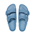 Top view of Elemental blue Arizona Sandal from Birkenstock. Two buckles straps over the top of the foot. Buckle is blue. Shop Online and In-store with shoe&me Mount Maunganui.