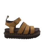 Side view of Savannah Tan Nubuck Blair Dr. Martens Sandal. Yellow stitching of sole, black and yellow pull tab on heel. Gold Buckle on ankle strap. Three over the top of the foot straps. Shop Womens Dr. Marten Sandals Online and in-store with shoe&me Mount Maunganui.
