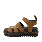 Inner Side view of Savannah Tan Nubuck Blair Dr. Martens Sandal. Yellow stitching of sole, black and yellow pull tab on heel. Gold Buckle on ankle strap. Three over the top of the foot straps. Shop Womens Dr. Marten Sandals Online and in-store with shoe&me Mount Maunganui.