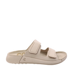 Side view of Cozmo Womens Ecco Slide. Light Beige coloured sole, limestone coloured leather upper. Velcro adjustable two-strap slide. Shop Womens summer slides and sandals online and in-store with shoe&me Mount Maunganui NZ