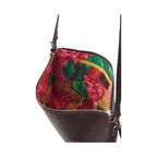 Inside of bag view of stevie chocolate briarwood bag. Flora canvas lined. Long shoulder strap with top strap with a tassle attached to the zip along the top of the bag. Dark Chocolate tubled leather look. Available with shoe&me Mount Maunganui Tauranga NZ.