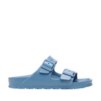 Side angle view of Elemental blue Arizona Sandal from Birkenstock. Two buckles straps over the top of the foot. Buckle is blue. Shop Online and In-store with shoe&me Mount Maunganui. 