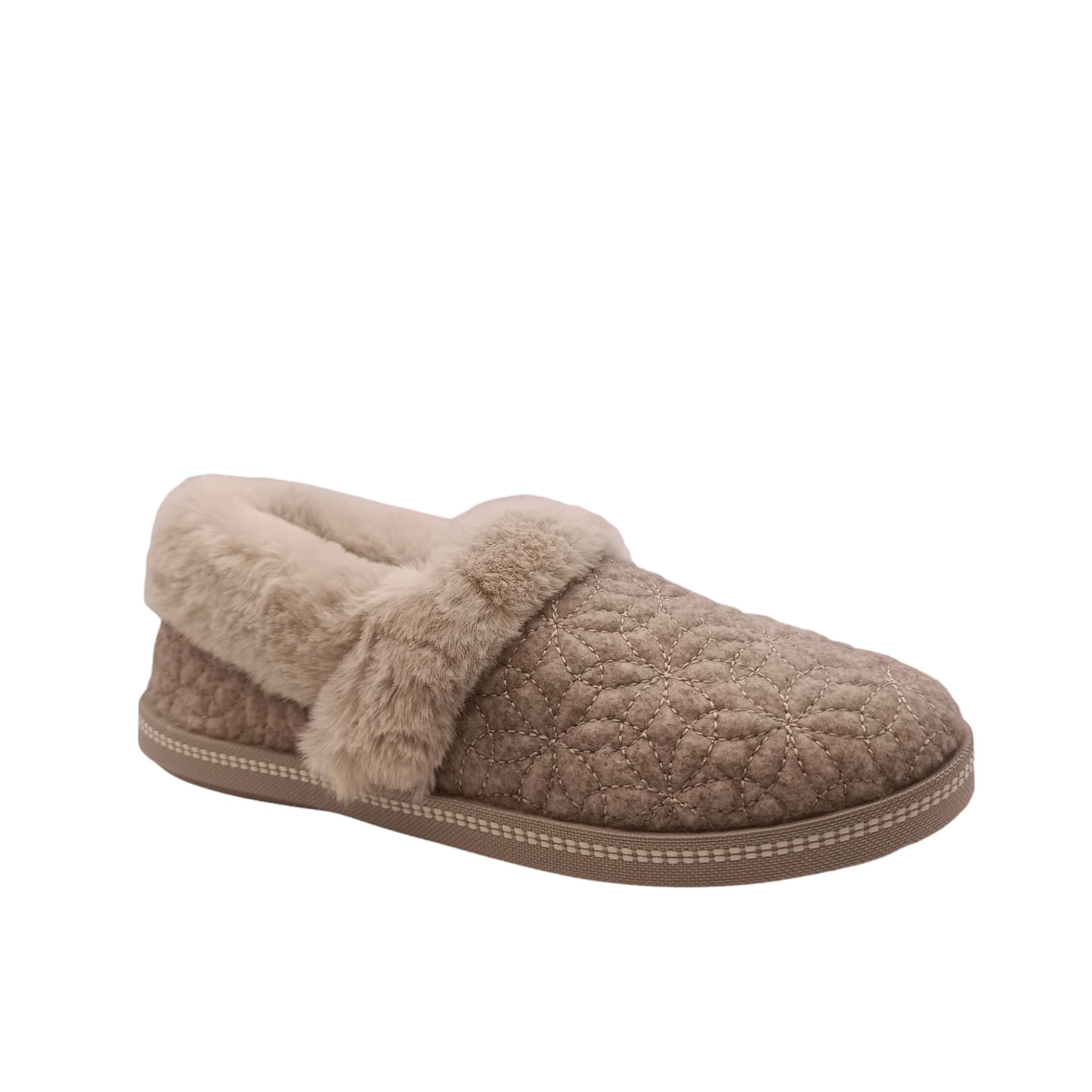 Side angled view of the Bright Blossom Skechers Slipper with a fluffy lining and a quilted flower pattern along the upper and back. Firm waterproof sole.