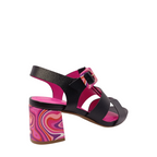 Back angle view of Colette from Capelli Rossi. Black leather heel with a bright swirl coloured block heel of pinks and purple with a matching buckle. Shop womens heels with shoe&me Mount Maunganui NZ