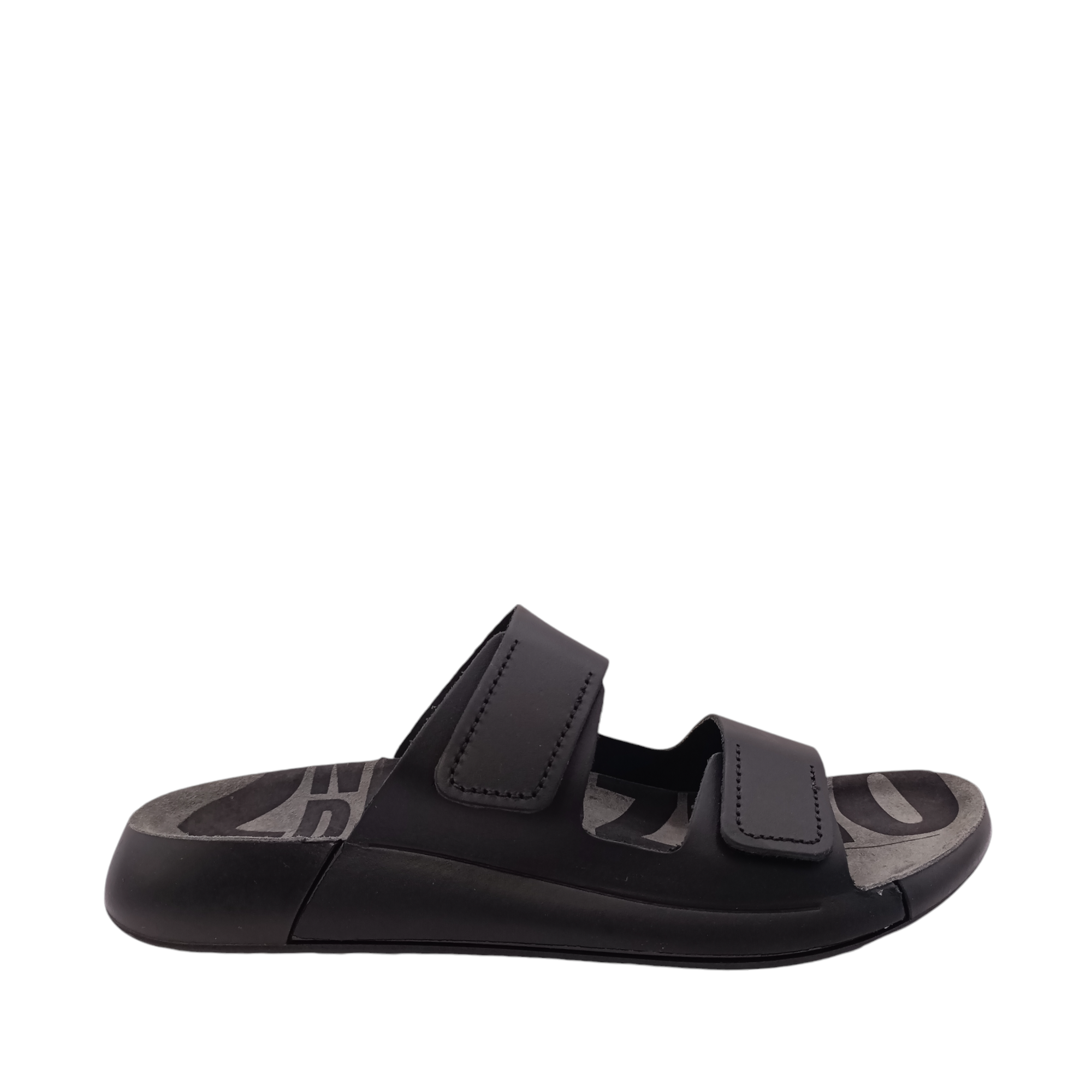 Side view of Cozmo Womens Ecco Slide. Matte black coloured leather upper with a black coloured sole. Velcro adjustable two-strap slide. Shop Womens summer slides and sandals online and in-store with shoe&me Mount Maunganui NZ