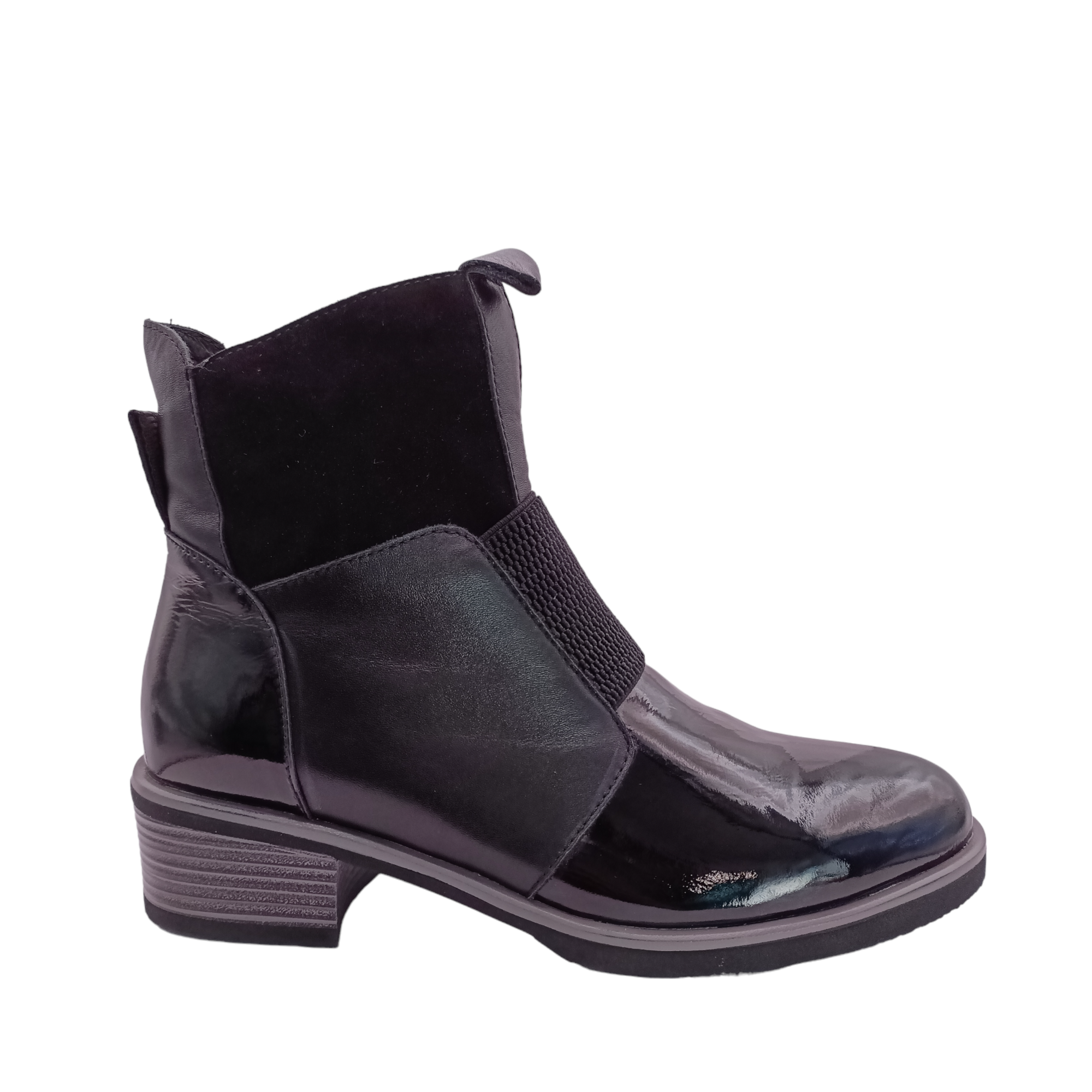 Shop Dread boot from Bresley. Outer side view of Black patent leather on the toe and the back heel. suede pieces of leather around the top of the boot. leather pieces on the sides. side zip and a gusset over the front. shoe&amp;me Mount Maunganui