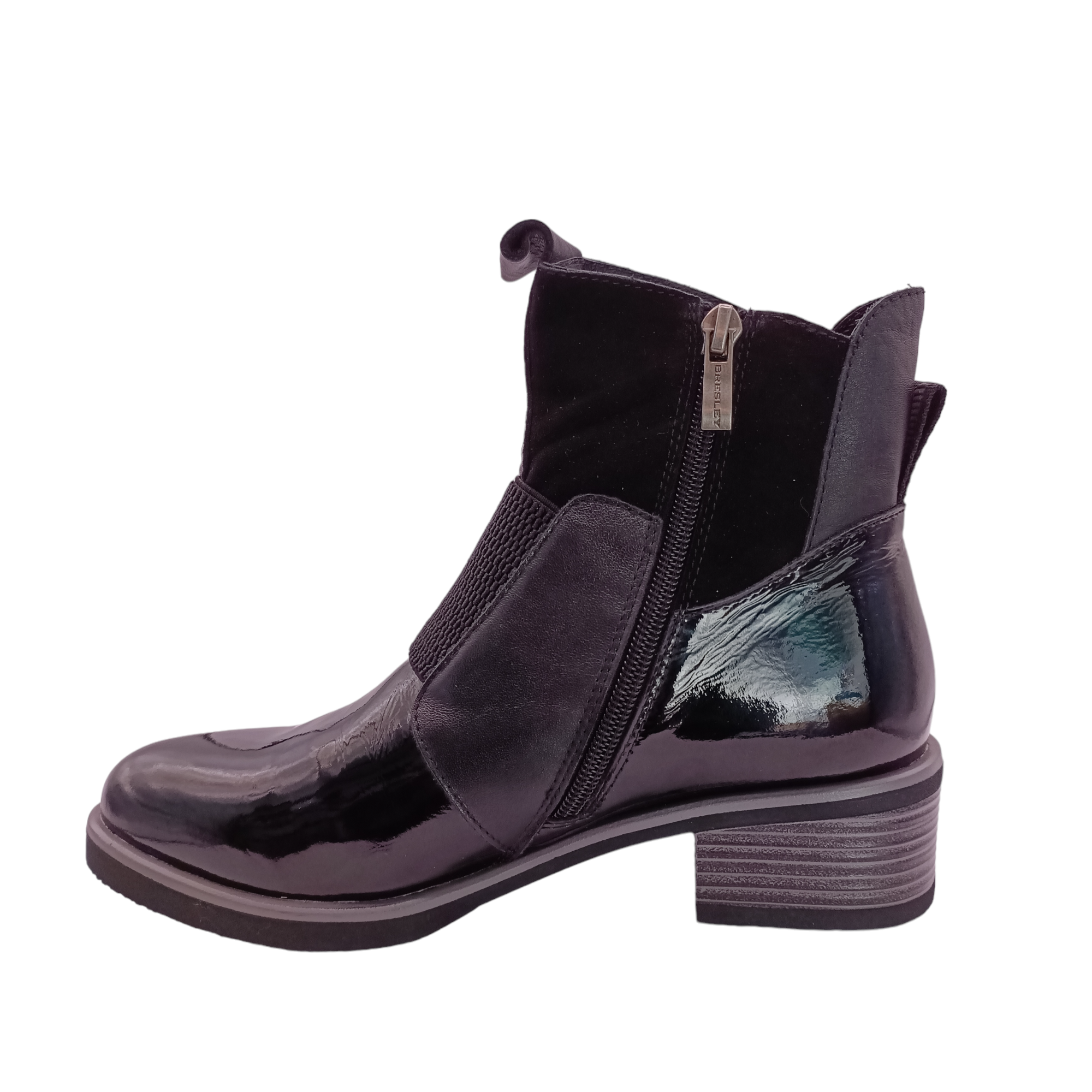 Shop Dread boot from Bresley. Inner side view of Black patent leather on the toe and the back heel. suede pieces of leather around the boot. side zip and a gusset over the front. shoe&amp;me Mount Maunganui