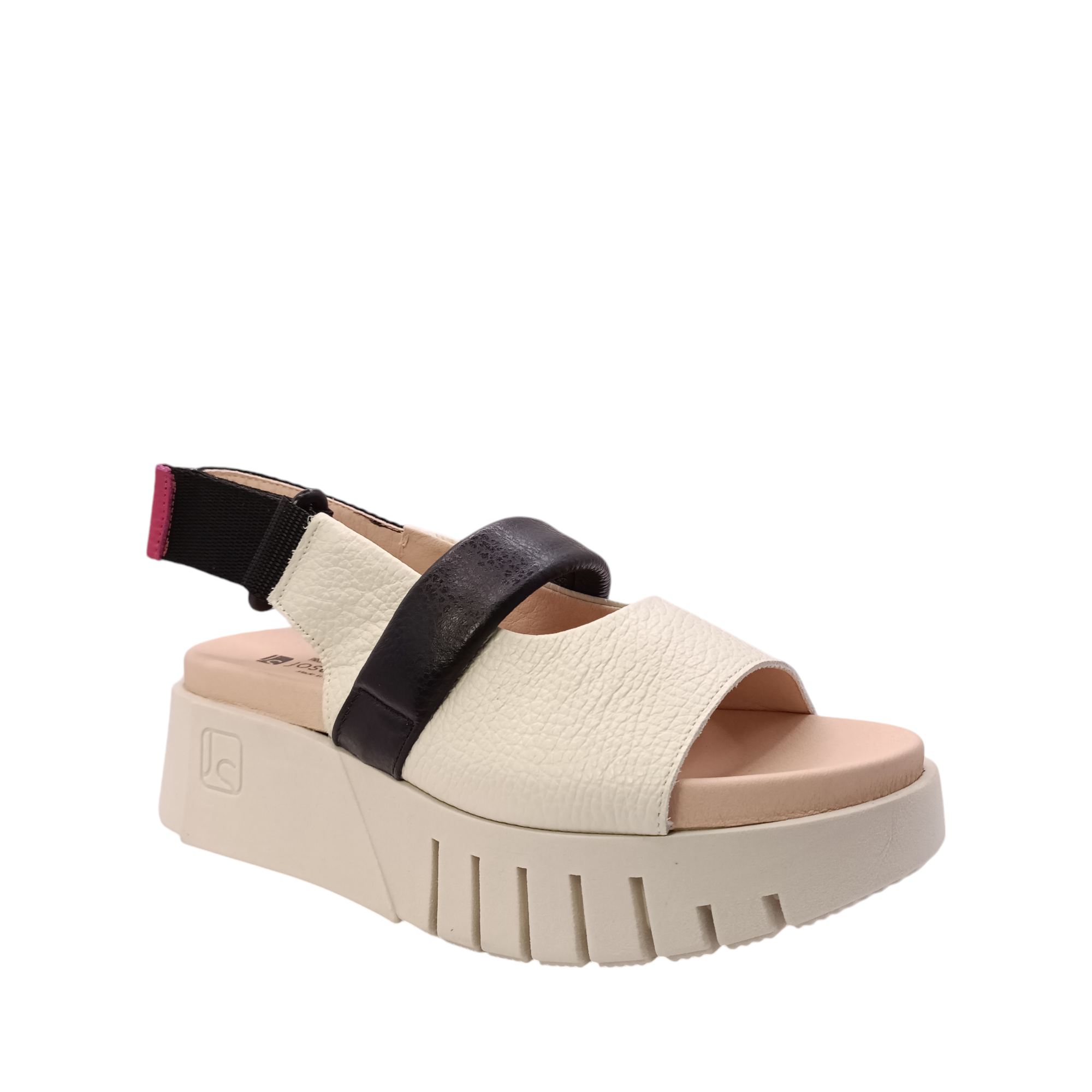 Front side view of the Jacky the bone coloured leather platform sandal from Jose Saenz. Open toe sandal with a black top of foot strap  over the top of the foot with an adjustable velcro back strap. Shop Womens Summer platform sandals online and in-store with shoe&me Mount Maunganui.