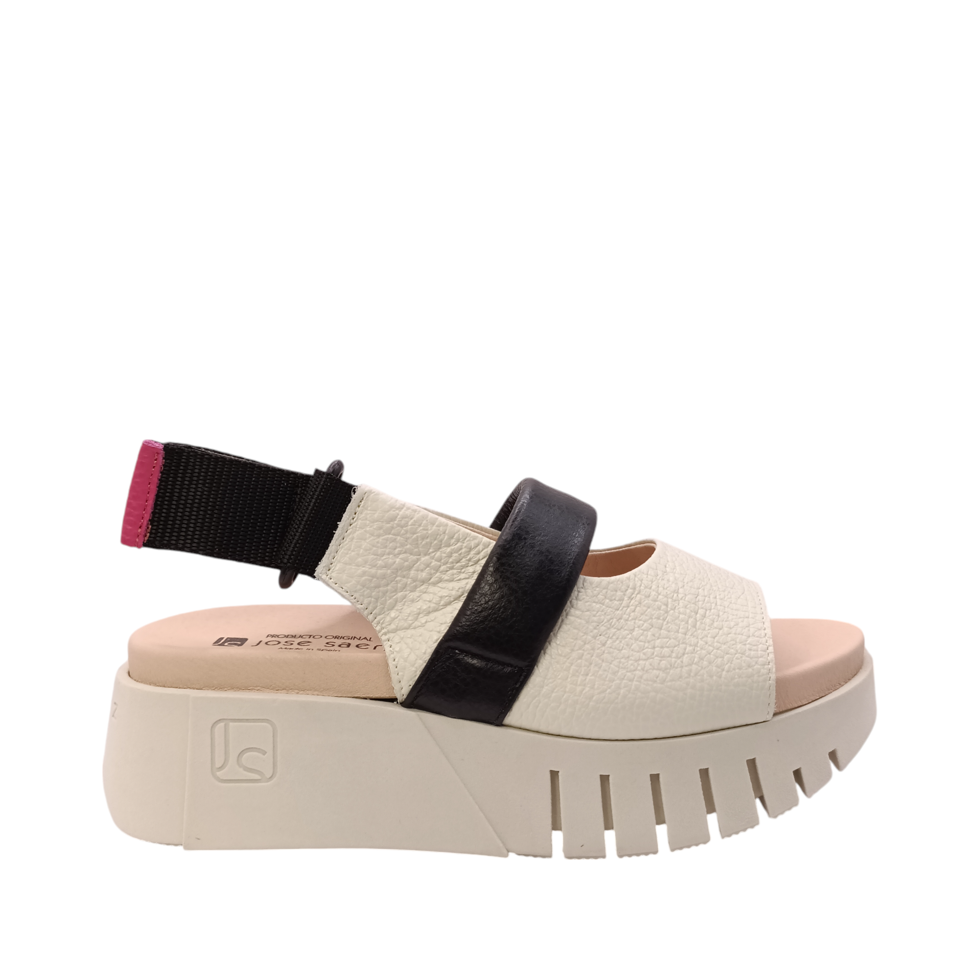 Side view of the Jacky the bone coloured leather platform sandal from Jose Saenz. Open toe sandal with a black top of foot strap  over the top of the foot with an adjustable velcro back strap. Shop Womens Summer platform sandals online and in-store with shoe&me Mount Maunganui.