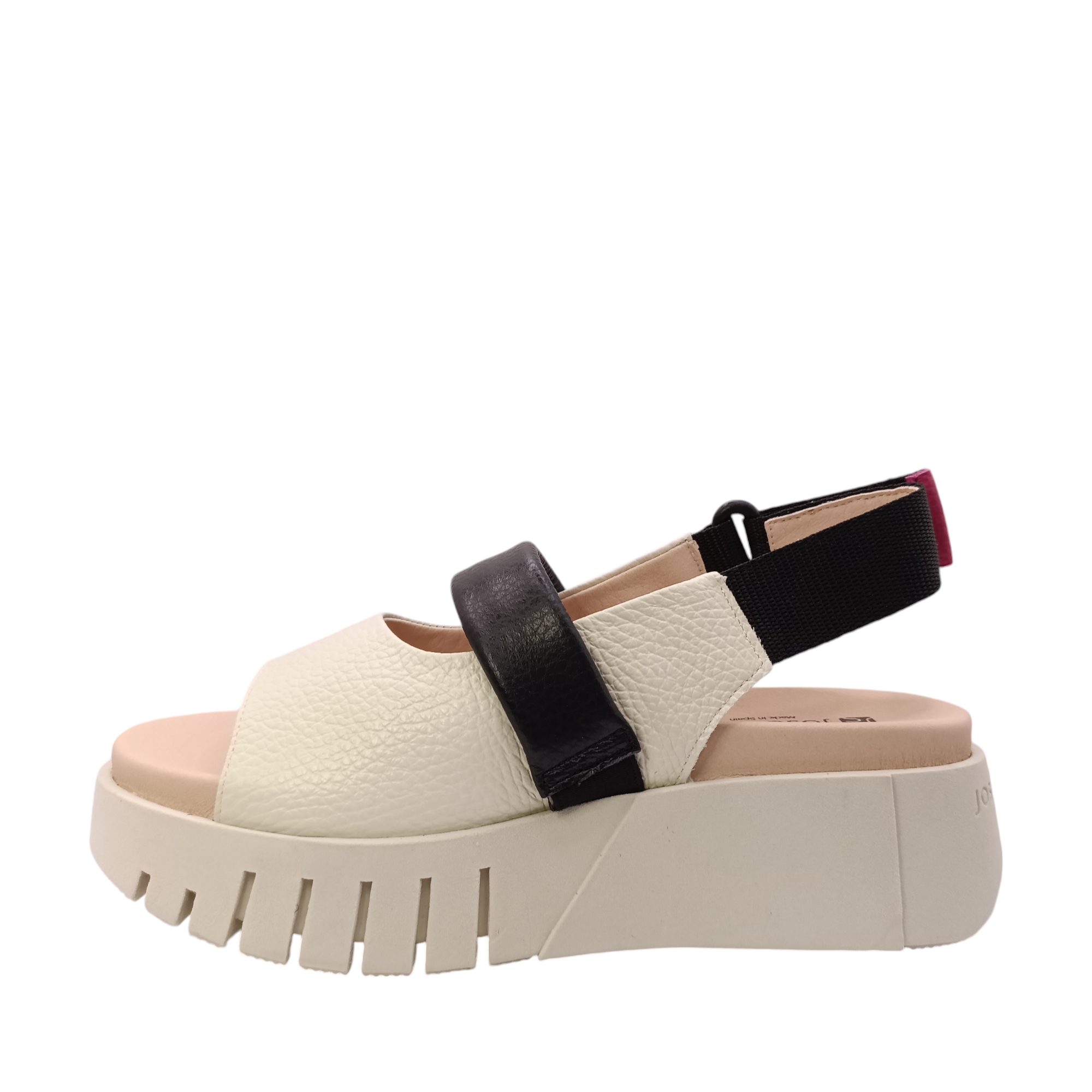 Side view of the Jacky the bone coloured leather platform sandal from Jose Saenz. Open toe sandal with a black top of foot strap  over the top of the foot with an adjustable velcro back strap. Shop Womens Summer platform sandals online and in-store with shoe&me Mount Maunganui.