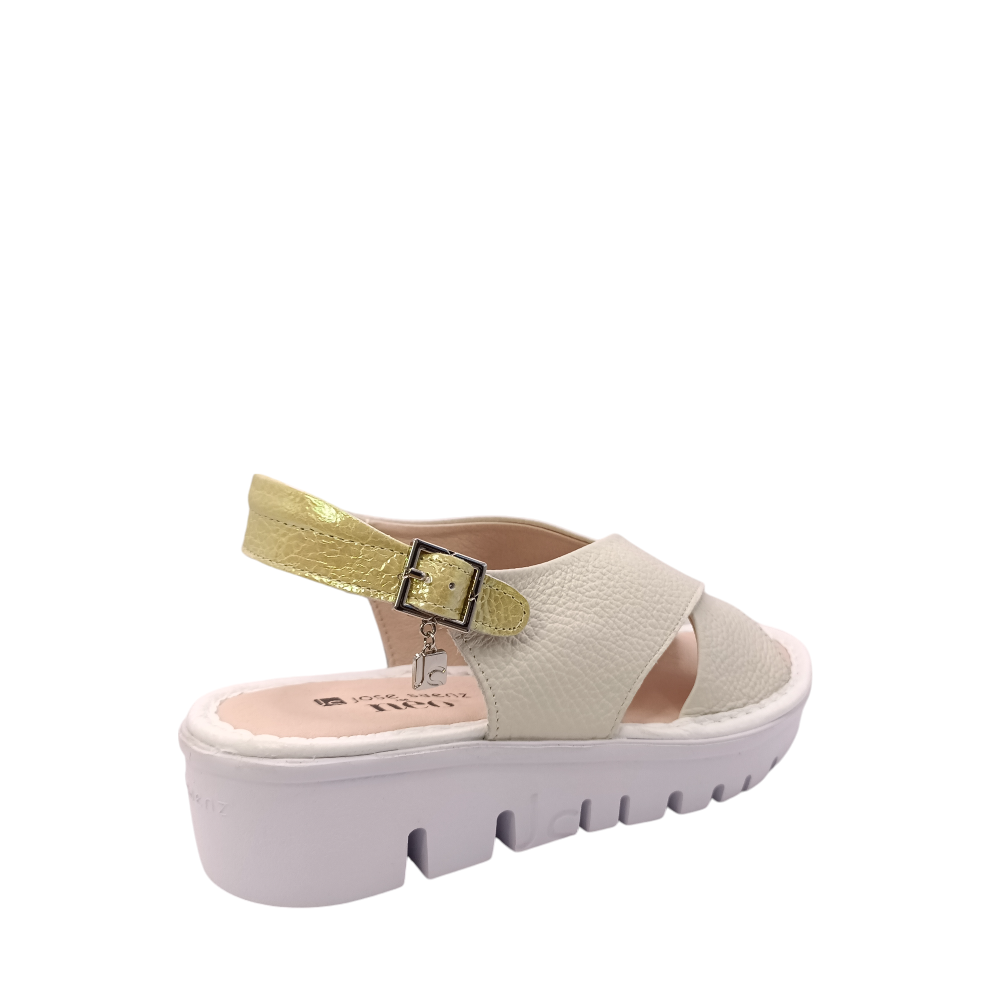 Back Side view of the bone coloured leather Jayne sandal from Jose Saenz. Criss-crossed straps over the top of the foot with an adjustable plae yellow back strap. Shop Womens Summer platform sandals online and in-store with shoe&me Mount Maunganui.