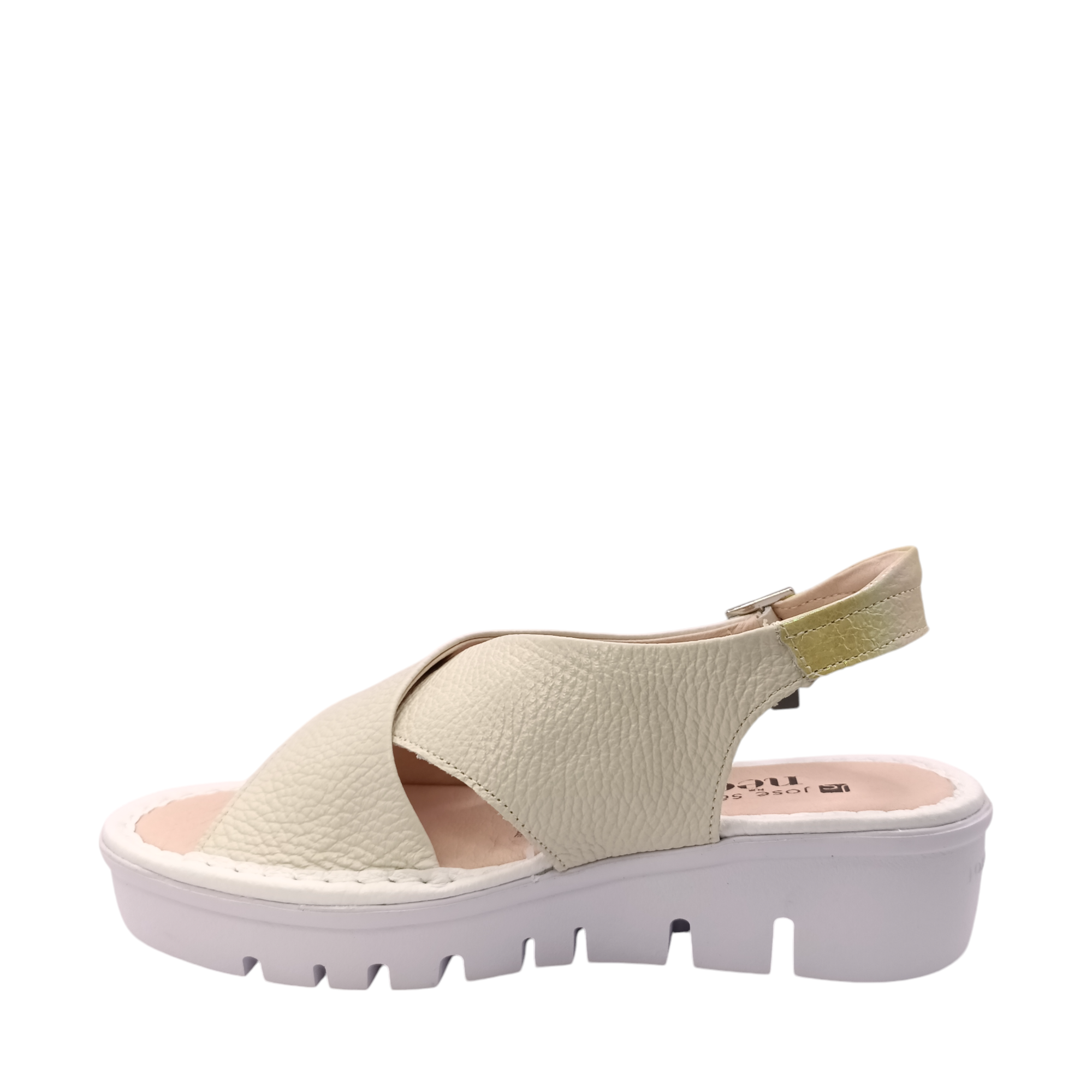 Side view of the bone coloured leather Jayne sandal from Jose Saenz. Criss-crossed straps over the top of the foot with an adjustable back strap. Shop Womens Summer platform sandals online and in-store with shoe&me Mount Maunganui.