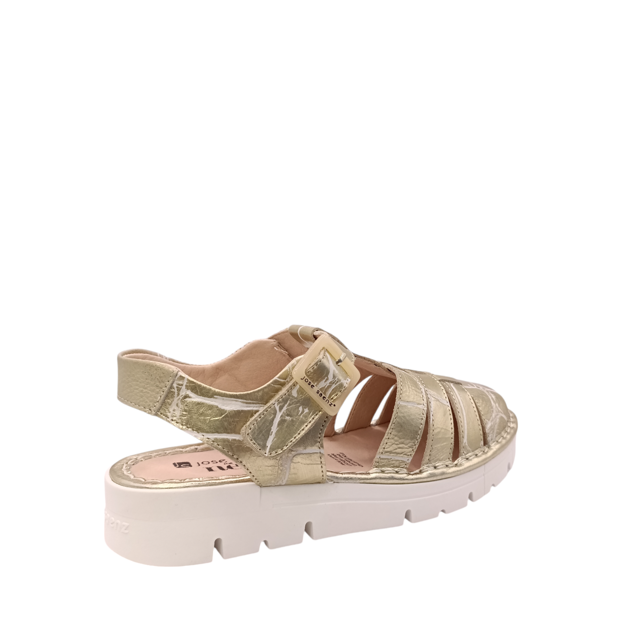 Back angled view of the gold Jazz covered toe sandal from Jose Saenz. Gold back-strap and adjustable buckle. Gold leather sandal with a white distressed cracked look. Shop Womens Summer covered toe platform sandals online and in-store with shoe&me Mount Maunganui.