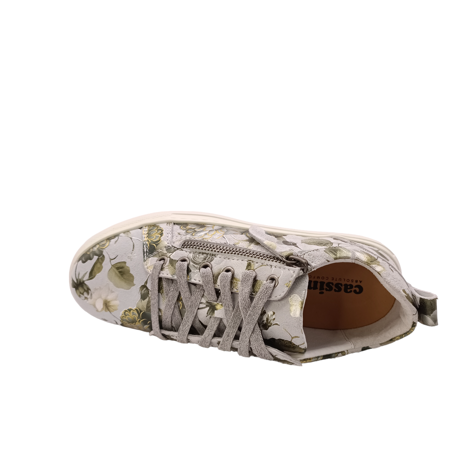 Silver sneaker with side zip. Leather printed with green and gold patterned floral design. Step into style and comfort with the stunning Cassini shoes. Featuring a unique floral and metallic pattern, these women's shoes offer the perfect blend of fashion and function. These&nbsp;Cassini shoes are sure to become your new go-to for comfortable style