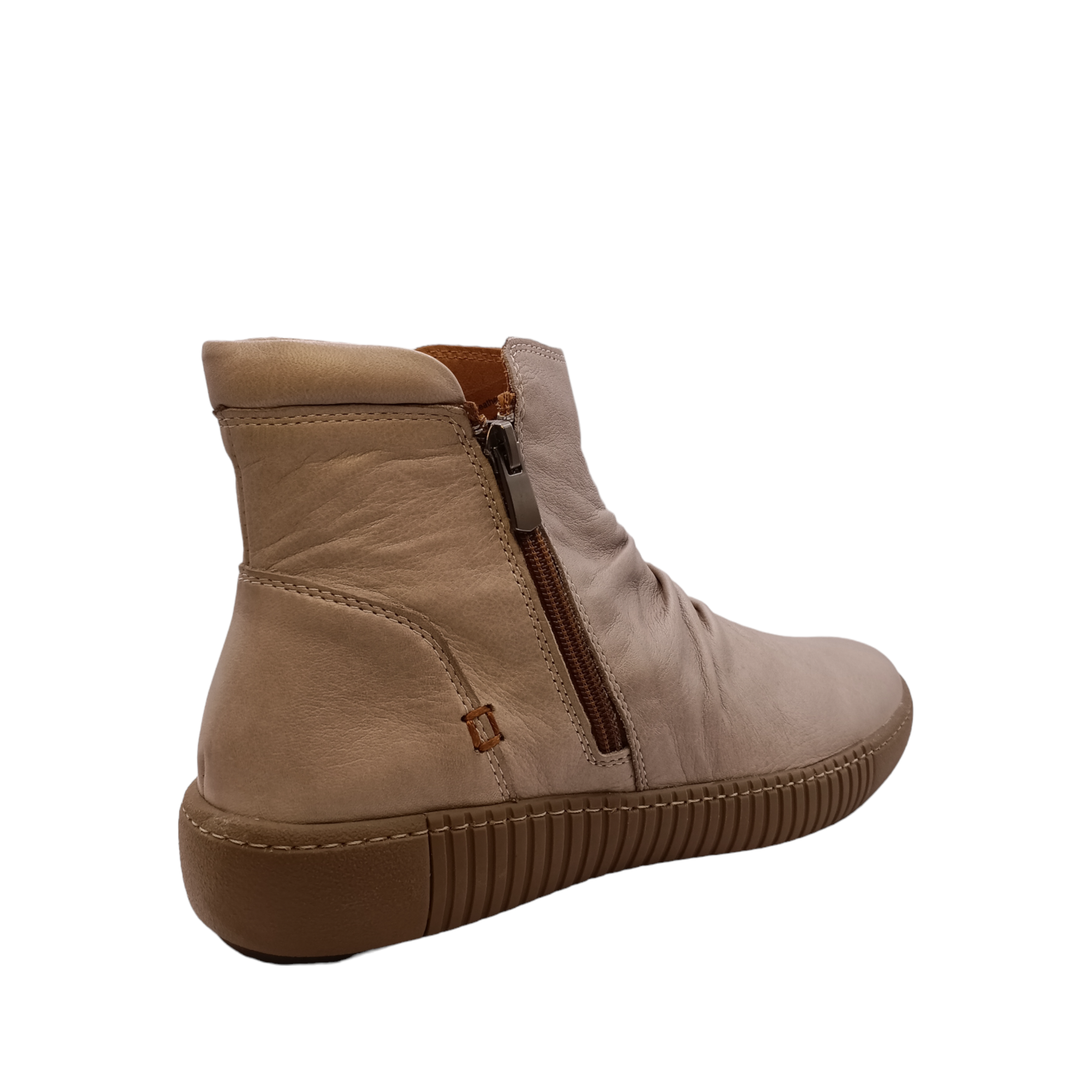 back angle view of Winnie from Cabello. Ivory coloured leather boot with two zips.