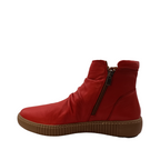 Side view of Winnie from Cabello. Red coloured leather boot with two zips.