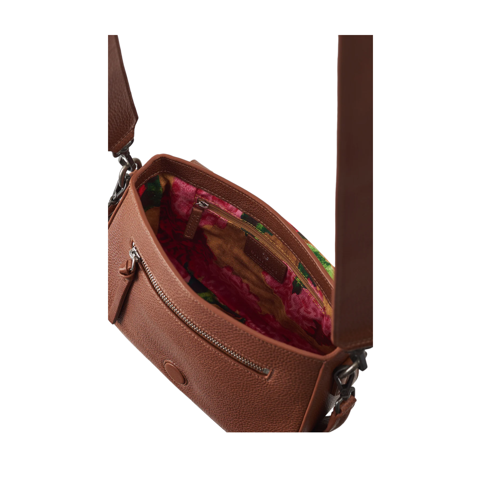view of inside, canvas lined with beautiful hydrangea pattern.of Quintana Briarwood Chestnut coloured handbag. Crafted with fine leather, with a shoulder strap and a short strap.